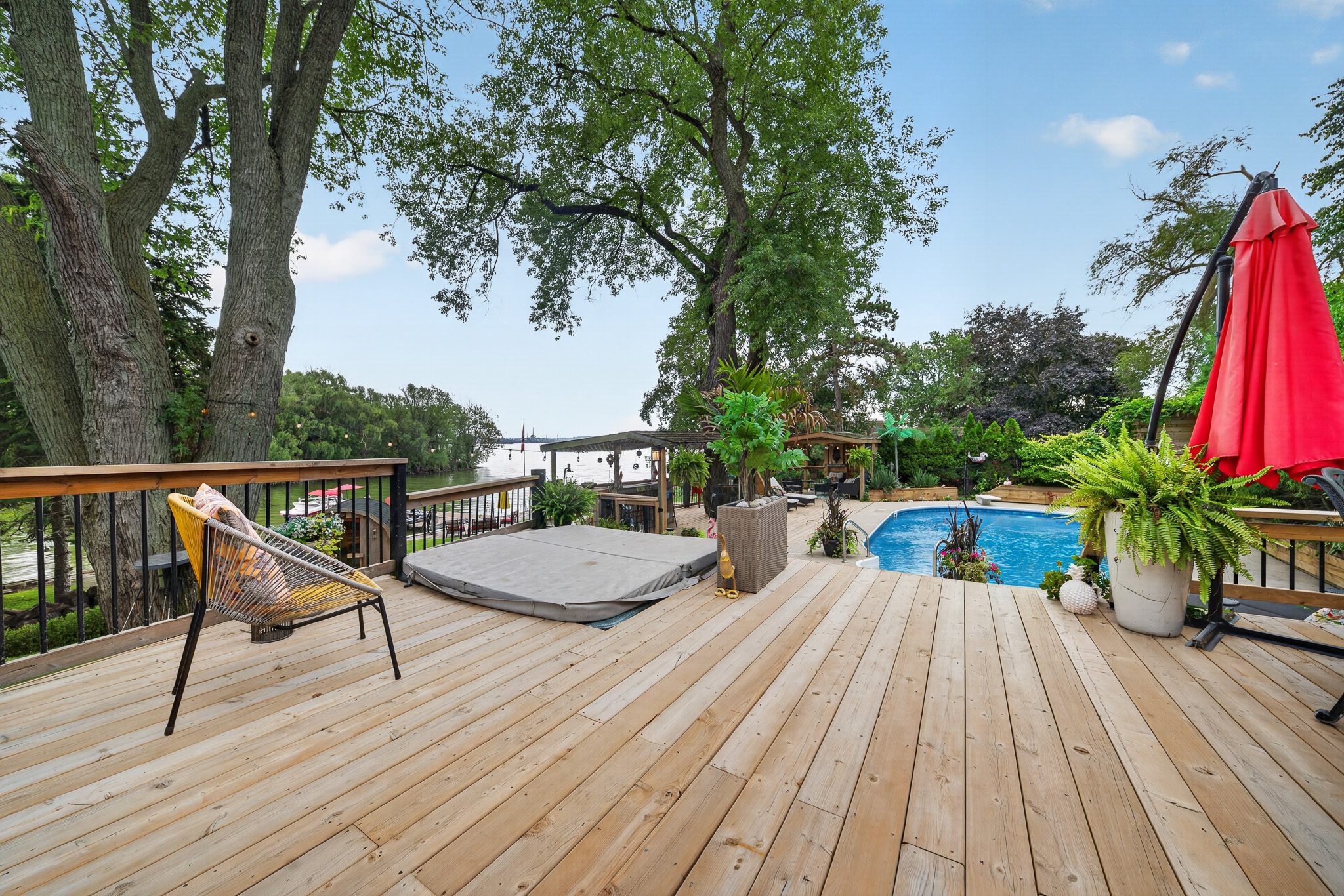 The hot tub on the deck above the pool