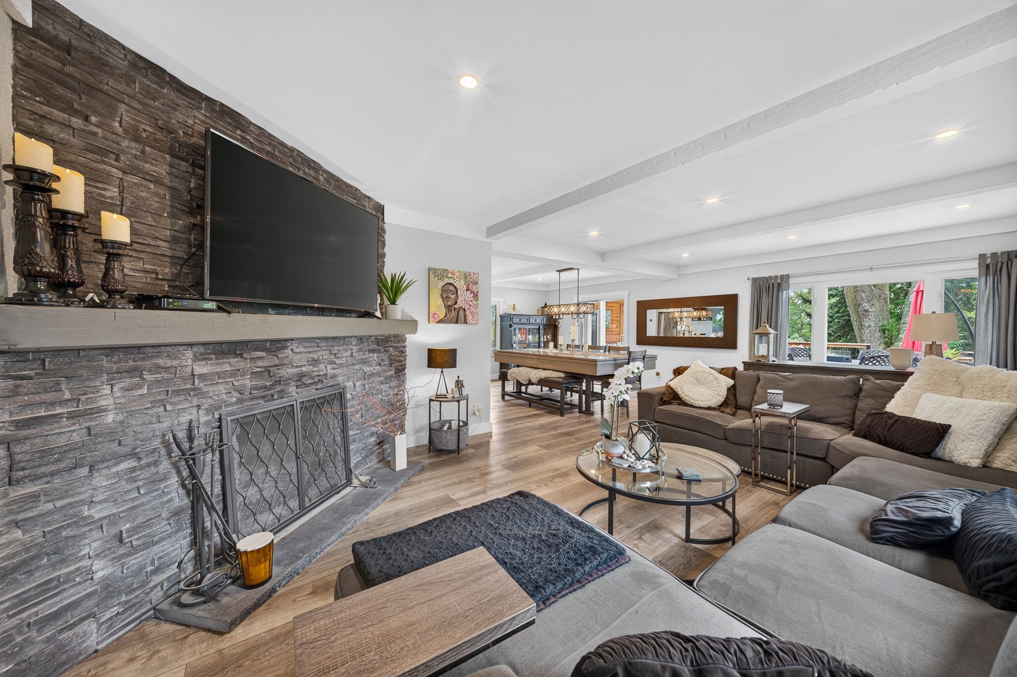 The living room and its stone fireplace