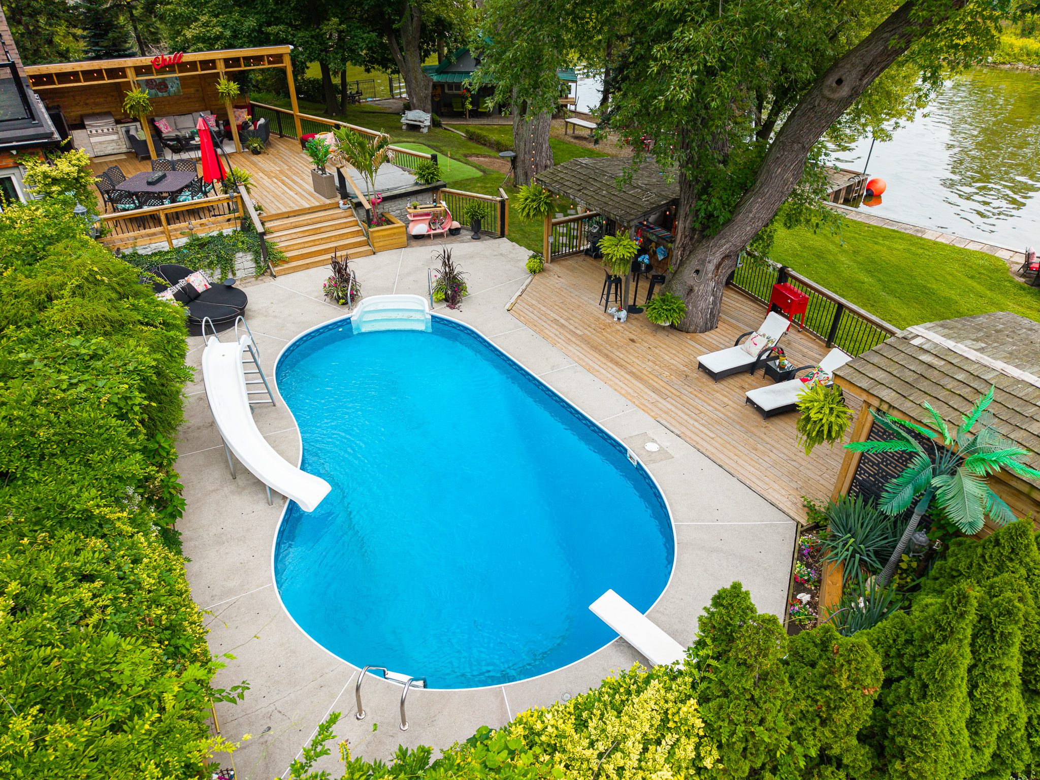 The pool, deck and gardens from above