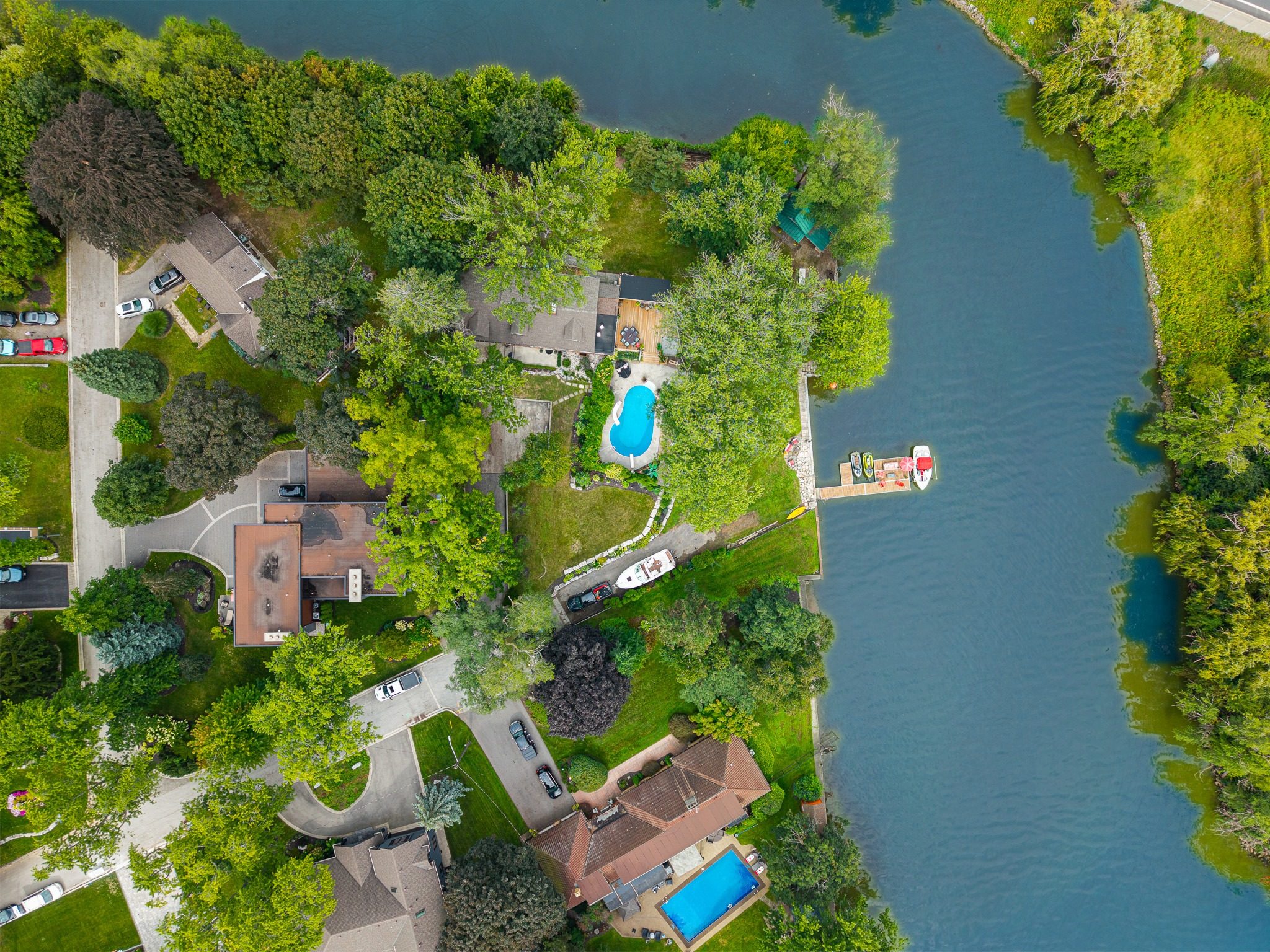 Top-down view of the property, the pool and the dock