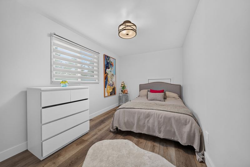 A bedroom on the upper level
