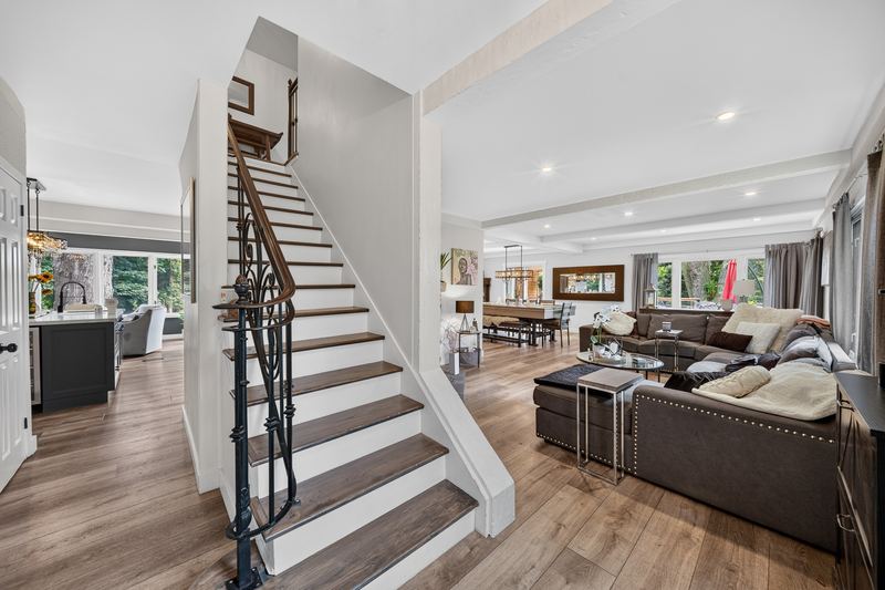 The foyer, the staircase and the living room