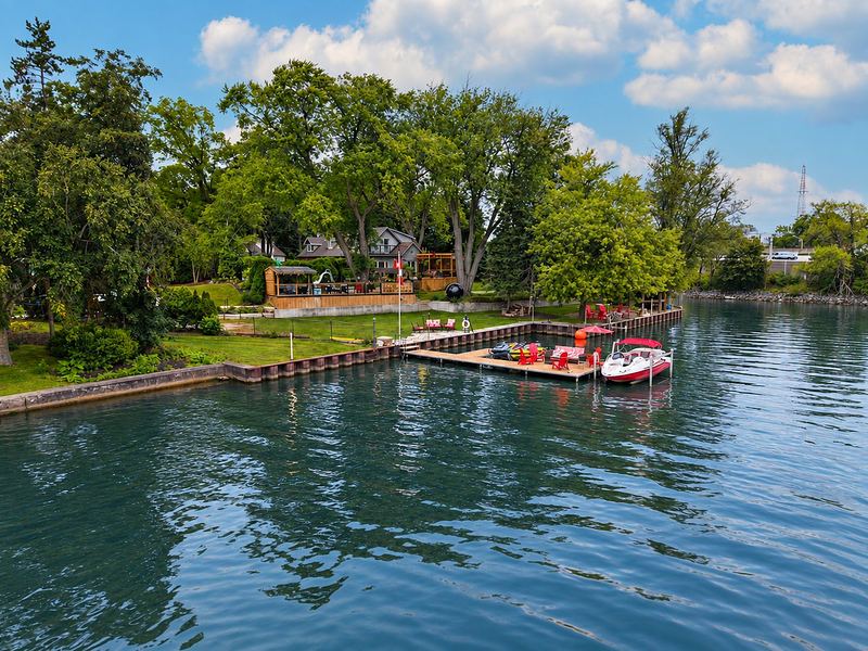 The property, the lawn and the dock from out on the bay