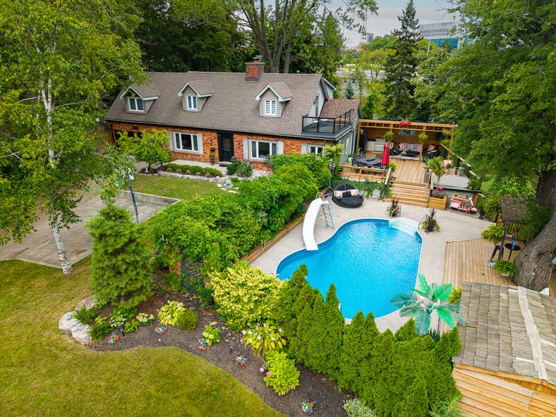 The front of the house and the pool from above