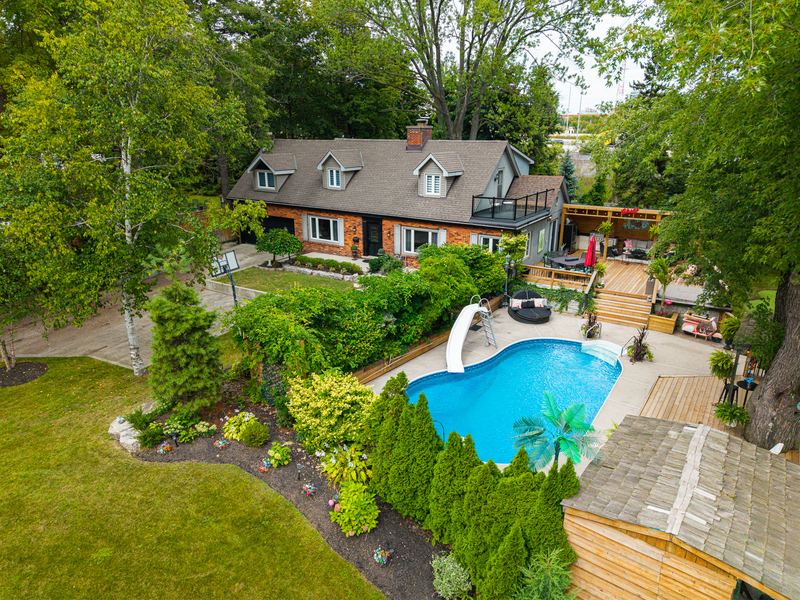 The house, pool and gardens from above