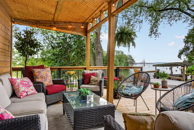 The covered lounge looking out to the bay