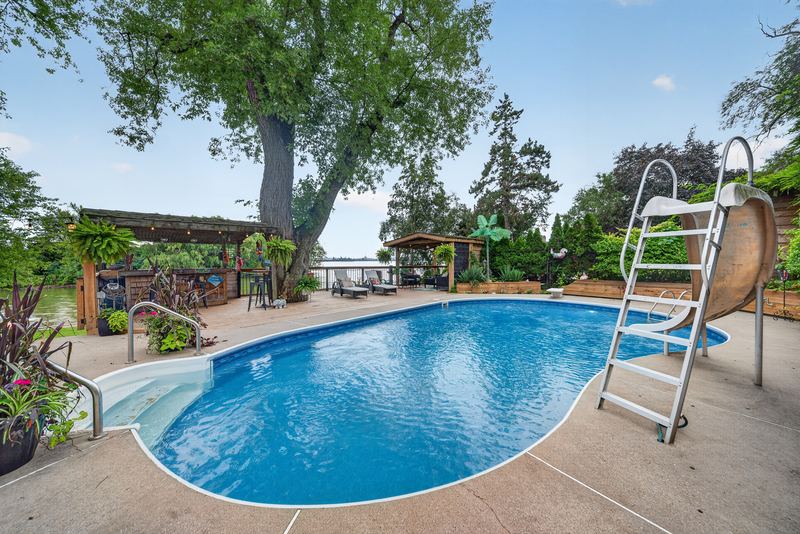 The pool and its slide in the gardens