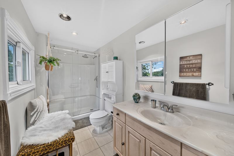 The ensuite with a glass shower
